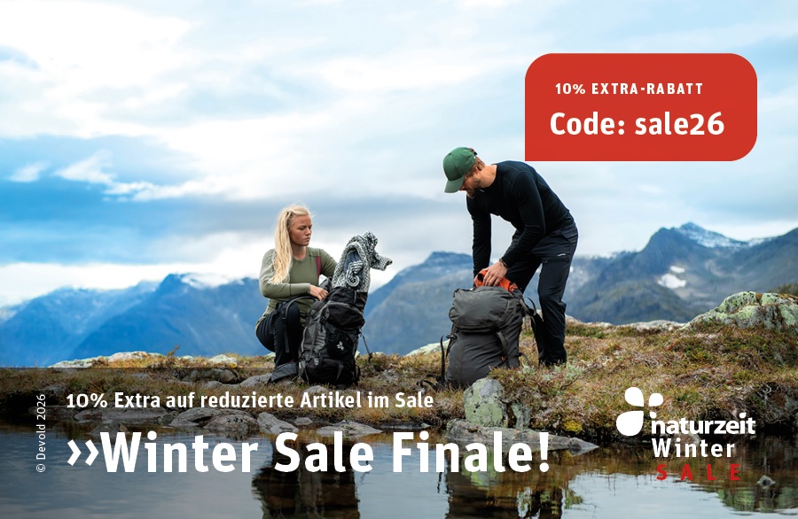 Winter Sale Finale - Outdoor Imagebild zwei Personen mit Rucksack im Gebirge